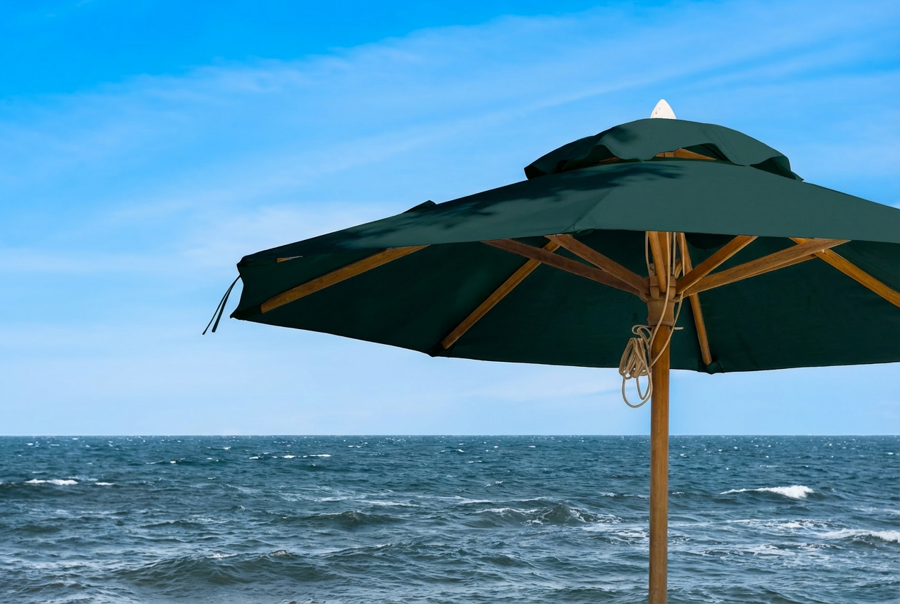 Beach umbrella rental on Folly Beach providing shade for beachgoers, perfect add-on for chair rentals and group beach setups in Charleston